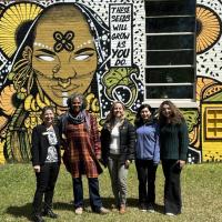 Faculty Fellow Sofia Perez-Guzman (third from right) joins SCoRE staff on a site visit to the ArtsXchange in East Point to explore mutual interests related to community resiliency (April 5, 2024)
