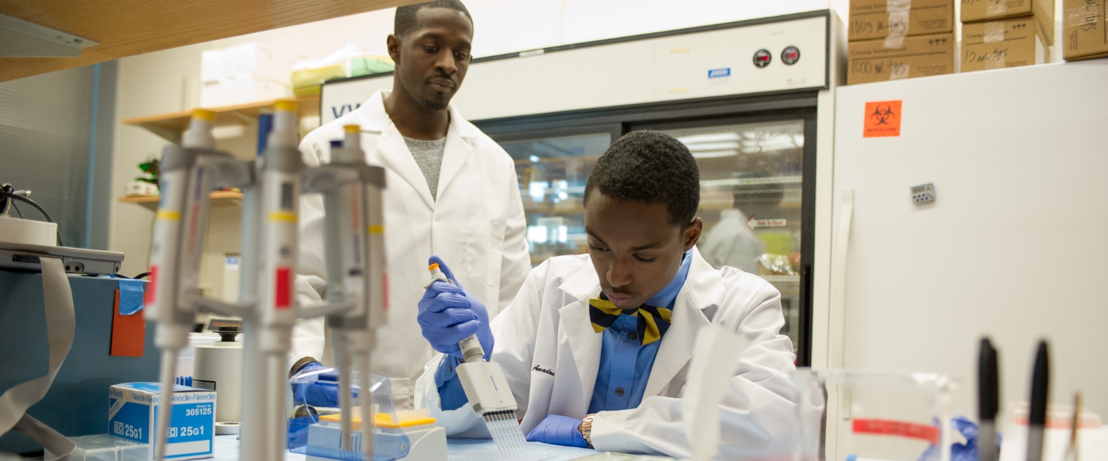 Student and mentor working in a Georgia Tech lab