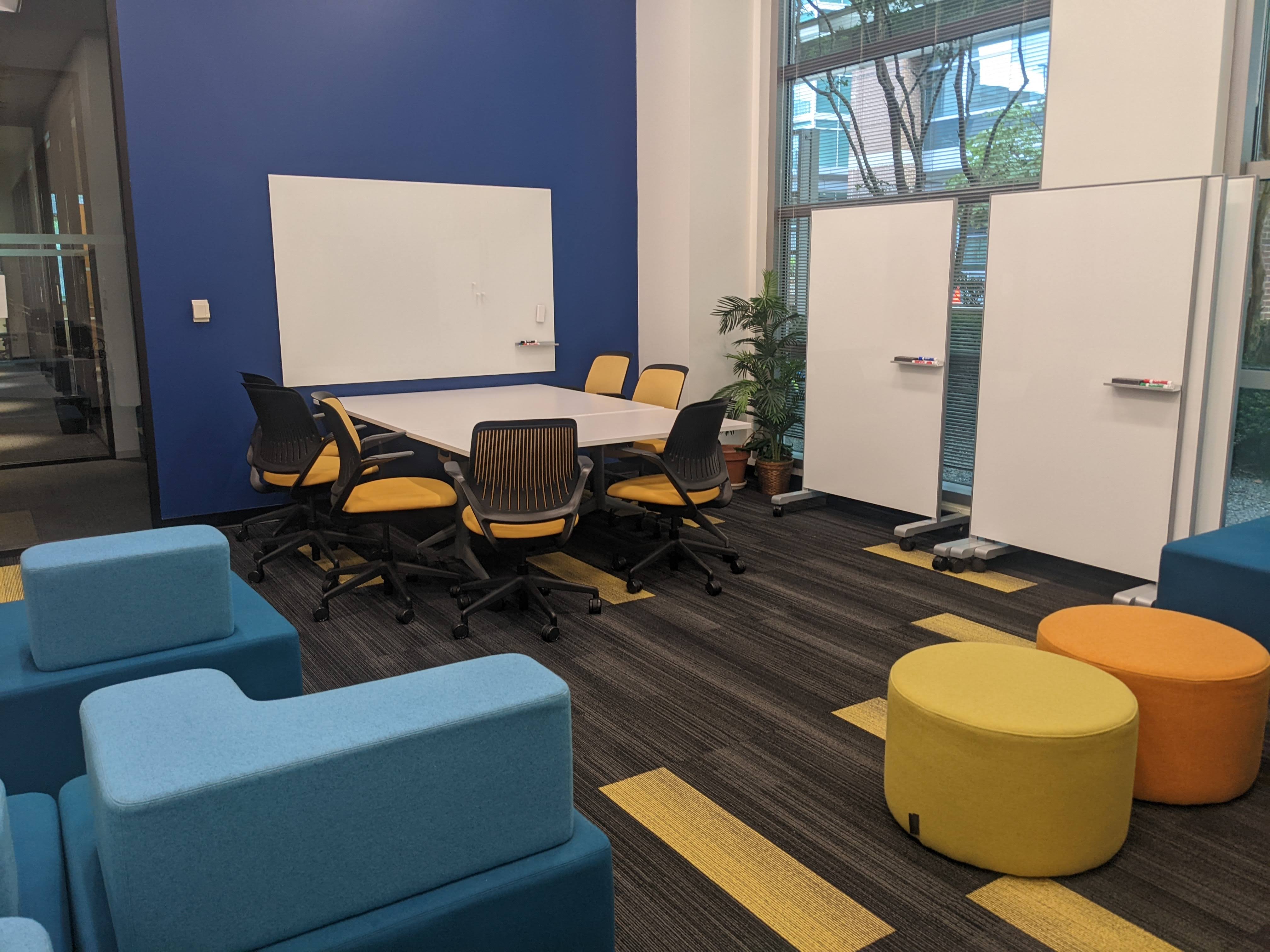 View of collaborative space furniture and table that seats six