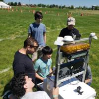<p>The RoboJackets' IGVC software team members test their code on the course. (Credit: RoboJackets)</p>