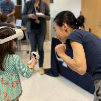 A young participant that is experiencing virtual reality for the first time at Georgia Tech